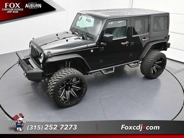 Photo of 2016 Black Clearcoat Jeep Wrangler Unlimited
