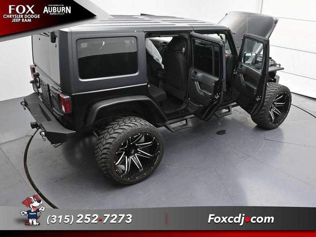 Photo of 2016 Black Clearcoat Jeep Wrangler Unlimited