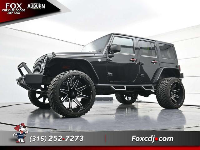 Photo of 2016 Black Clearcoat Jeep Wrangler Unlimited