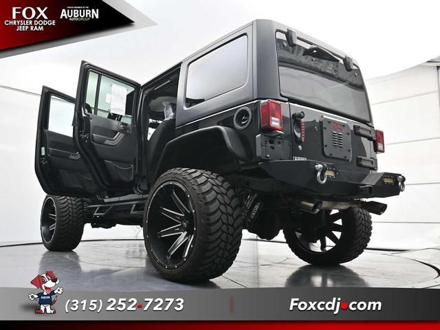 Photo of 2016 Black Clearcoat Jeep Wrangler Unlimited