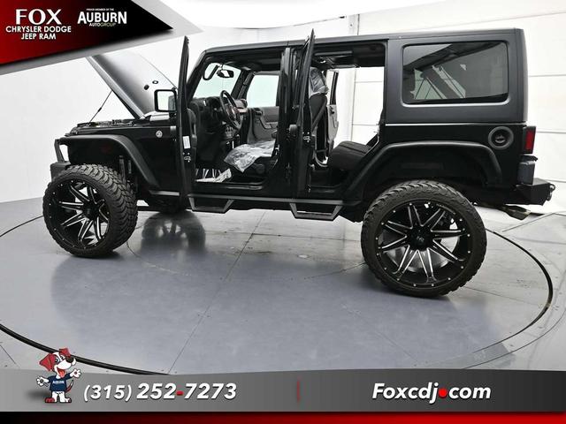 Photo of 2016 Black Clearcoat Jeep Wrangler Unlimited