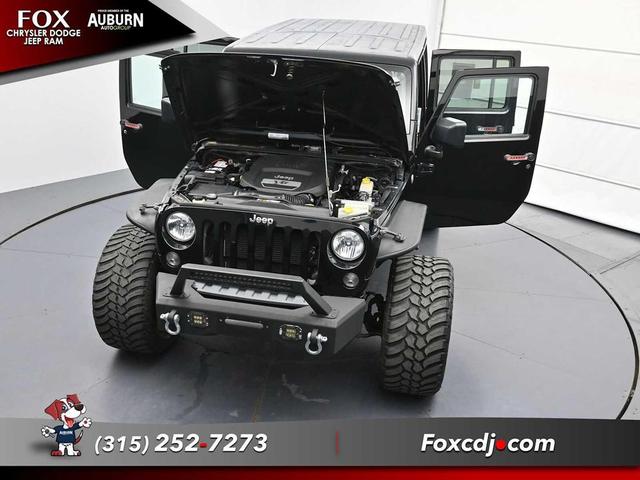 Photo of 2016 Black Clearcoat Jeep Wrangler Unlimited