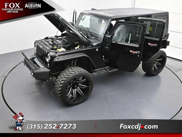 Photo of 2016 Black Clearcoat Jeep Wrangler Unlimited