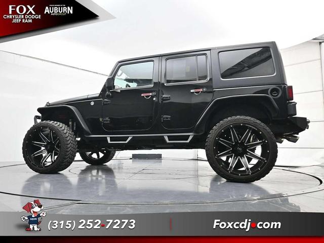 Photo of 2016 Black Clearcoat Jeep Wrangler Unlimited