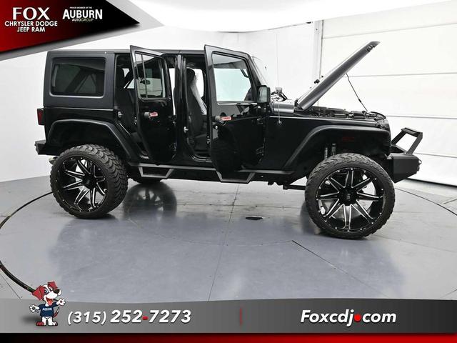Photo of 2016 Black Clearcoat Jeep Wrangler Unlimited