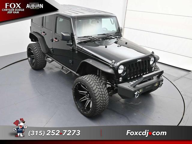 Photo of 2016 Black Clearcoat Jeep Wrangler Unlimited