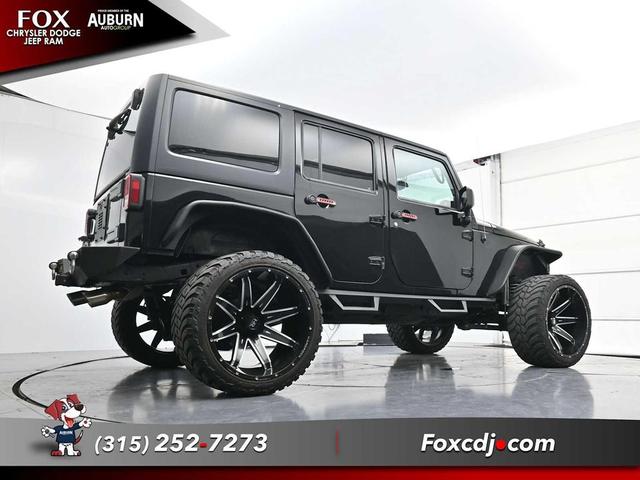 Photo of 2016 Black Clearcoat Jeep Wrangler Unlimited