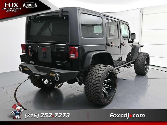 Photo of 2016 Black Clearcoat Jeep Wrangler Unlimited