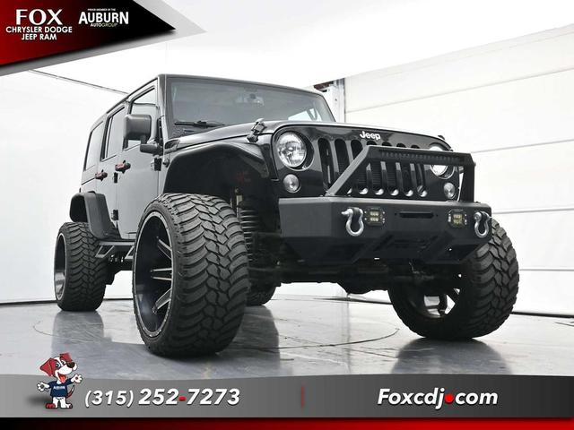 Photo of 2016 Black Clearcoat Jeep Wrangler Unlimited