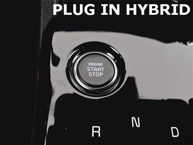 Photo of 2024 Fusion Orange Kia Sportage Plug-In Hybrid