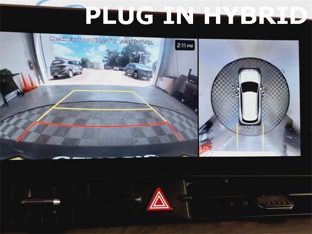Photo of 2024 Fusion Orange Kia Sportage Plug-In Hybrid