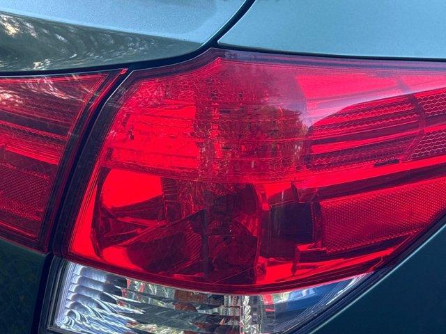 Photo of 2011 Cypress Green Pearl Subaru Outback