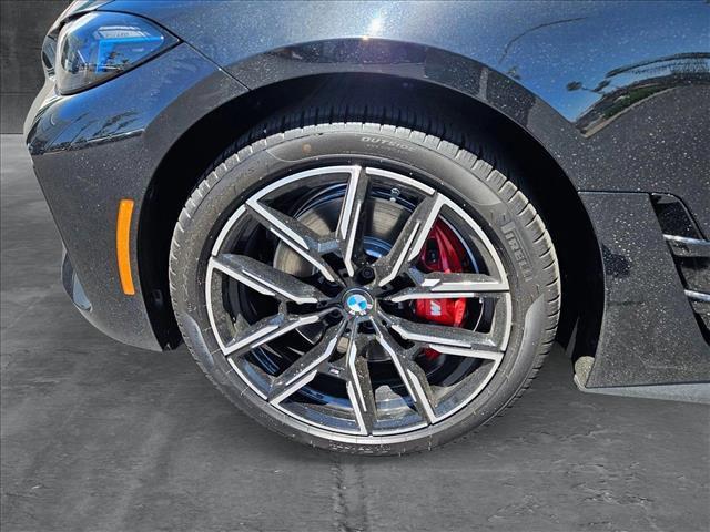 Photo of 2025 Black Sapphire Metallic BMW i4 Gran Coupe