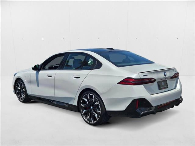 Photo of 2026 Mineral White Metallic BMW 550e