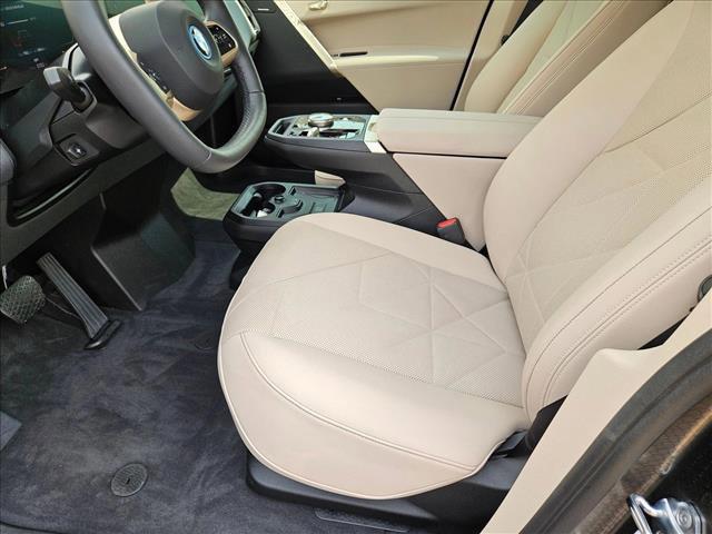 Photo of 2025 Black Sapphire Metallic BMW iX