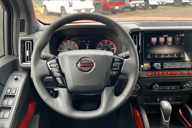 Photo of 2025 Afterburn Orange Nissan Frontier