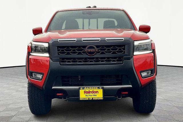 Photo of 2025 Afterburn Orange Nissan Frontier