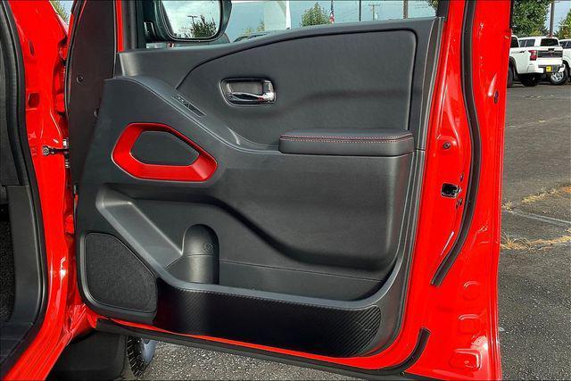 Photo of 2025 Afterburn Orange Nissan Frontier