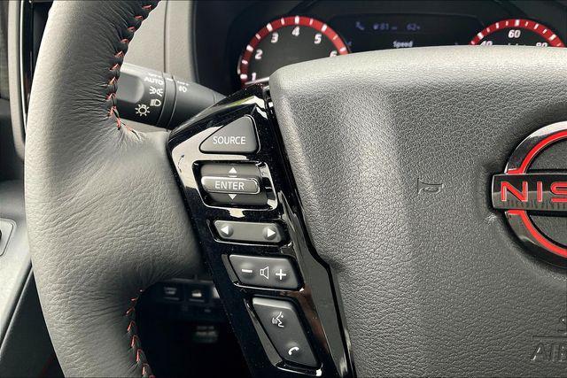 Photo of 2025 Afterburn Orange Nissan Frontier