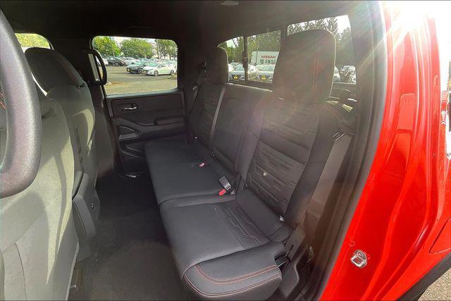 Photo of 2025 Afterburn Orange Nissan Frontier