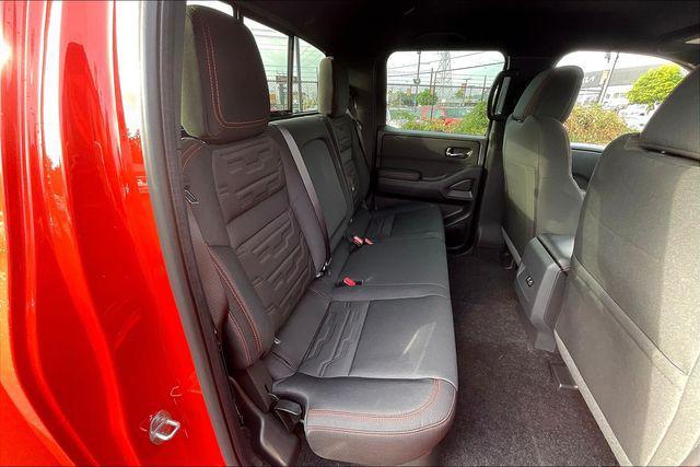 Photo of 2025 Afterburn Orange Nissan Frontier
