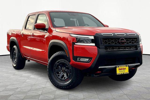 Photo of 2025 Afterburn Orange Nissan Frontier
