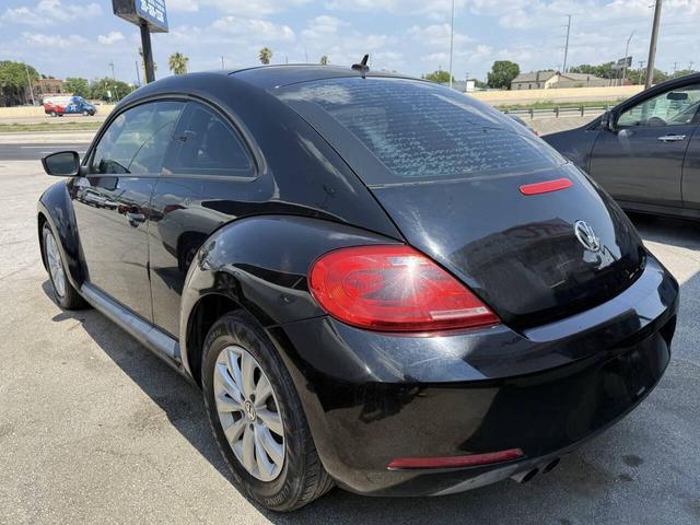 Photo of 2015 Black Uni Volkswagen Beetle