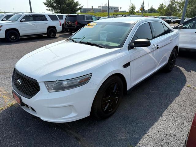 Photo of 2014 White Ford Sedan Police Interceptor