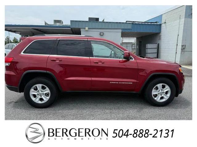 Photo of 2015 Deep Cherry Red Crystal Pearlcoat Jeep Grand Cherokee