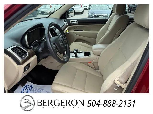 Photo of 2015 Deep Cherry Red Crystal Pearlcoat Jeep Grand Cherokee