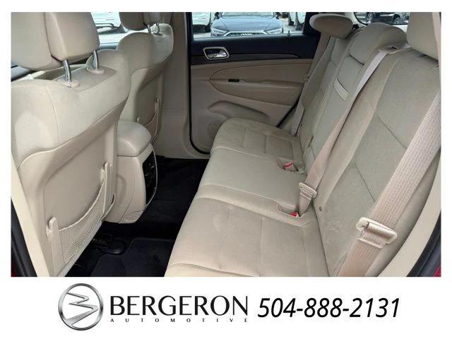 Photo of 2015 Deep Cherry Red Crystal Pearlcoat Jeep Grand Cherokee