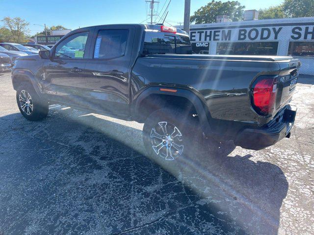 Photo of 2024 Deep Bronze Metallic GMC Canyon