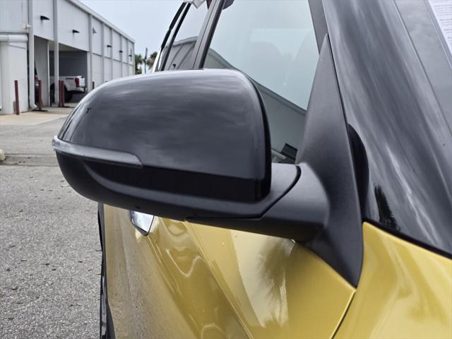 Photo of 2023 Starbright Yellow/Black Roof Kia Seltos