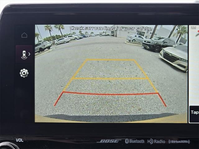 Photo of 2023 Starbright Yellow/Black Roof Kia Seltos