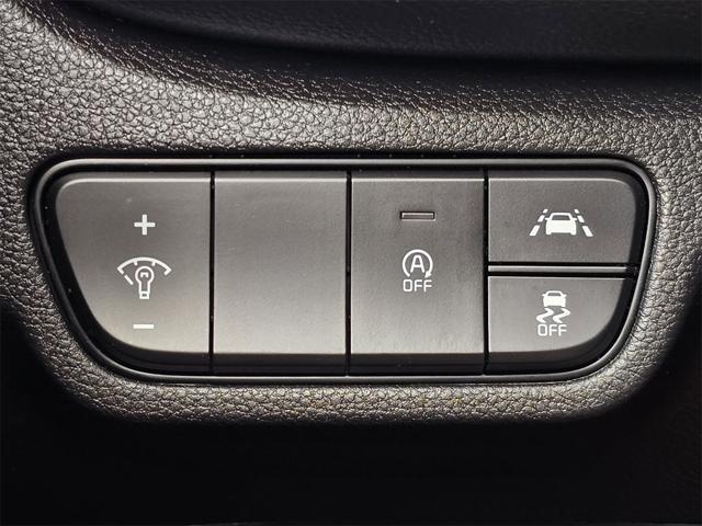 Photo of 2023 Starbright Yellow/Black Roof Kia Seltos