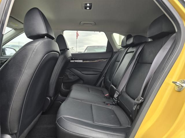 Photo of 2023 Starbright Yellow/Black Roof Kia Seltos