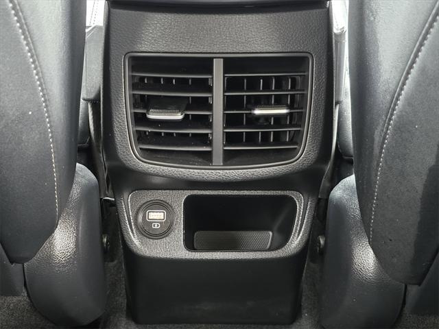 Photo of 2023 Starbright Yellow/Black Roof Kia Seltos