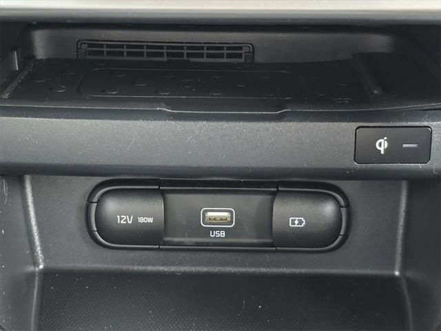 Photo of 2023 Starbright Yellow/Black Roof Kia Seltos