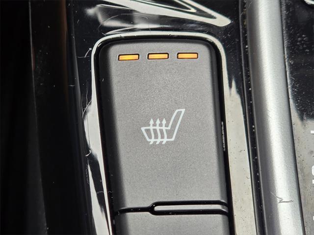 Photo of 2023 Starbright Yellow/Black Roof Kia Seltos
