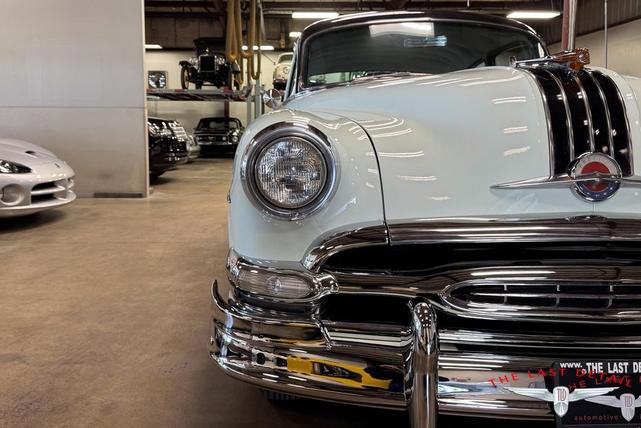 Photo of 1954 Shannon Green / Raven Black Pontiac Chieftain