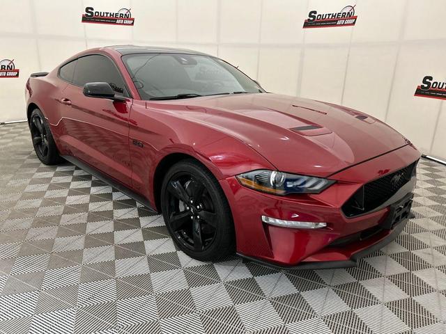 Photo of 2021 Rapid Red Metallic Tinted Clearcoat Ford Mustang