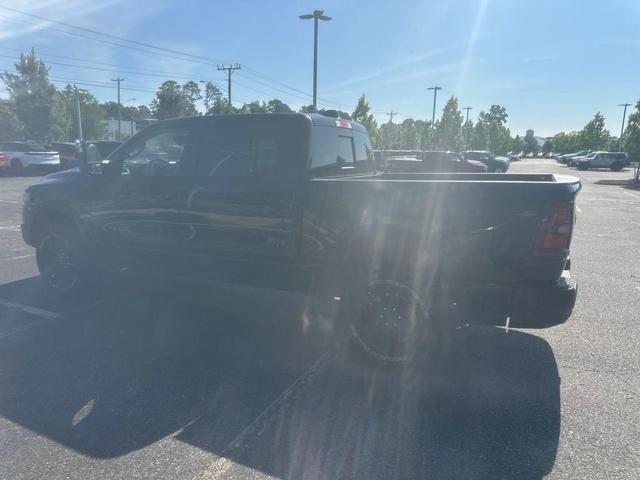 Photo of 2025 Diamond Black Crystal Pearlcoat RAM 1500