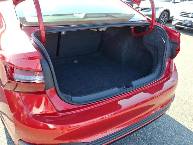 Photo of 2022 Kings Red Volkswagen Jetta