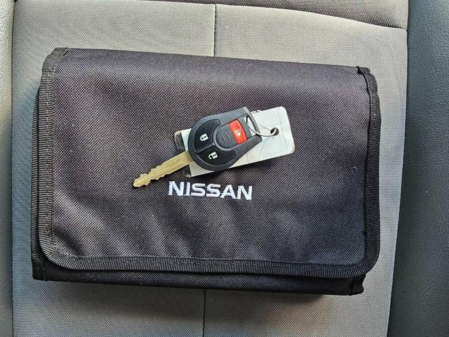 Photo of 2016 Glacier White Nissan NV Cargo NV1500