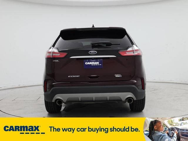 Photo of 2020 Burgundy Ford Edge