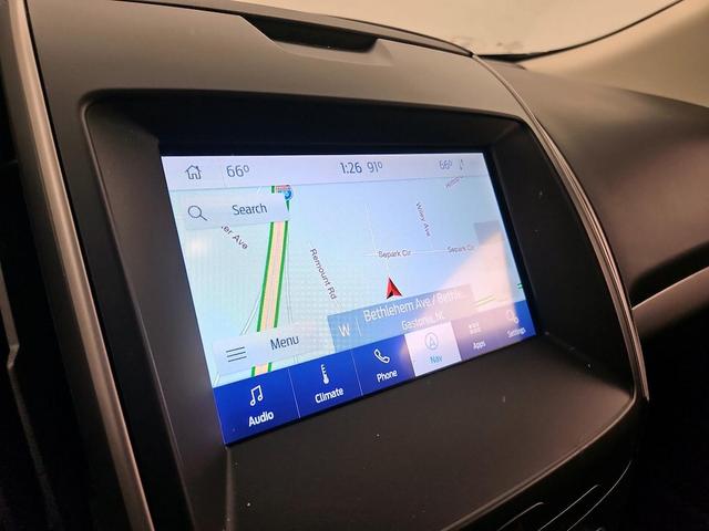 Photo of 2020 Burgundy Ford Edge