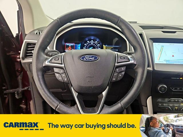 Photo of 2020 Burgundy Ford Edge