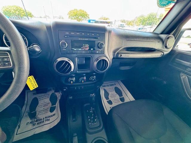 Photo of 2015 Black Clearcoat Jeep Wrangler Unlimited