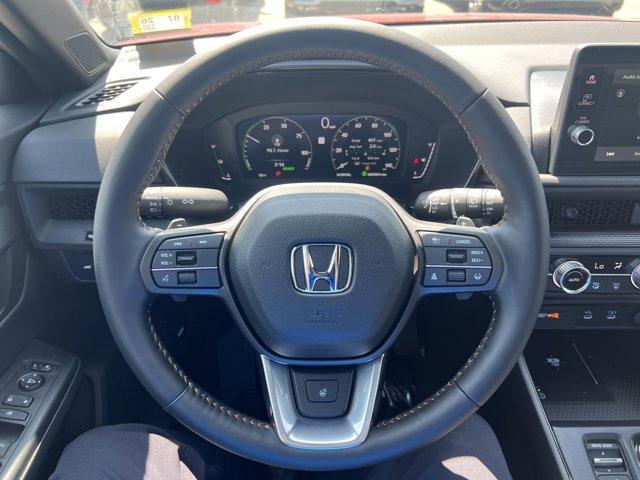 Photo of 2026 Radiant Red Metallic Honda CR-V Hybrid