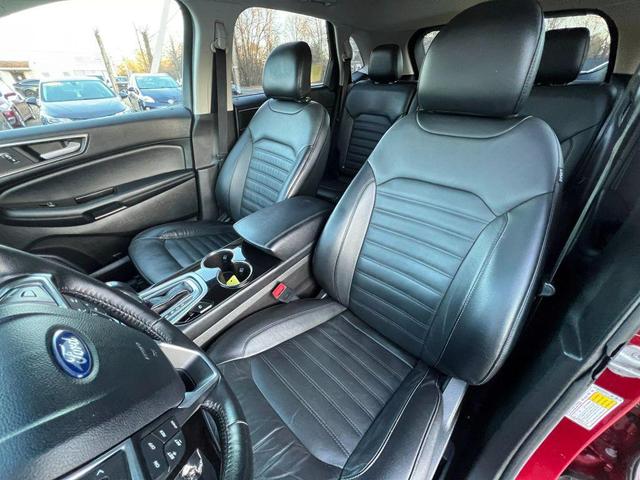 Photo of 2015 Ruby Red Metallic Tinted Clearcoat Ford Edge